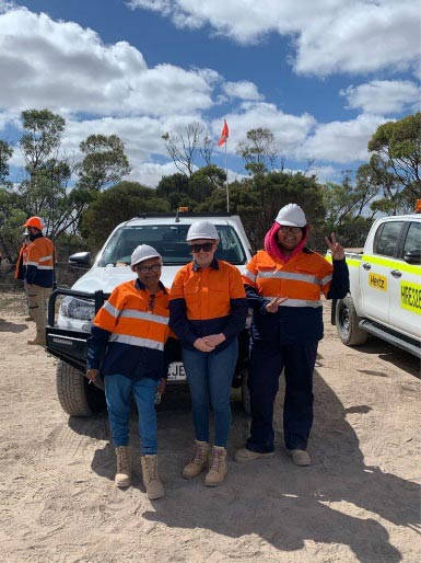 Platinum staff on site, standing by work vehicles